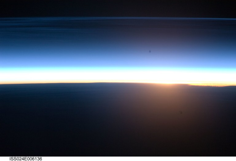 Polar Mesospheric Clouds at Orbital Sunrise (NASA, International Space Station Science, 06/16/10)